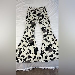 Flare cow print jeans. NEVER WORN.